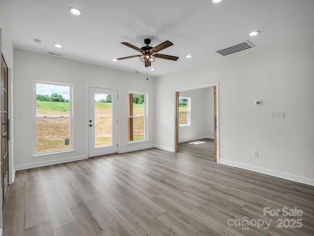 174 Charlie Randall Rd, Lawndale, NC 28090 - spare room featuring recessed lighting, a ceiling fan, wood finished floors, and a smoke detector