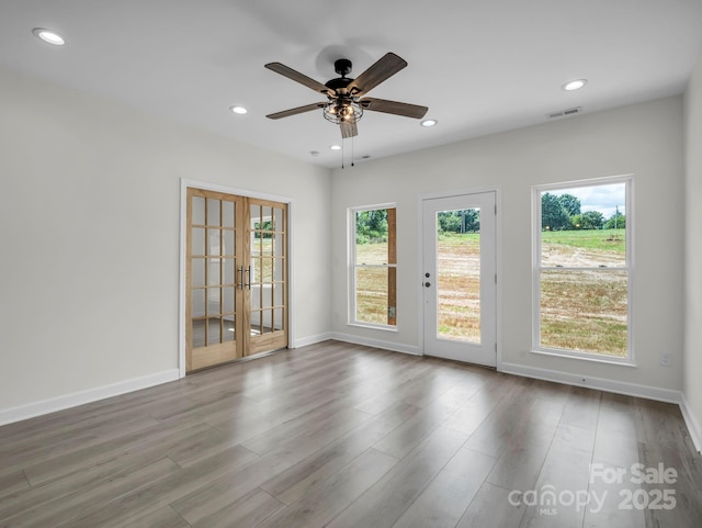 174 Charlie Randall Rd, Lawndale, NC 28090 - empty room featuring french doors, recessed lighting, a ceiling fan, and wood finished floors