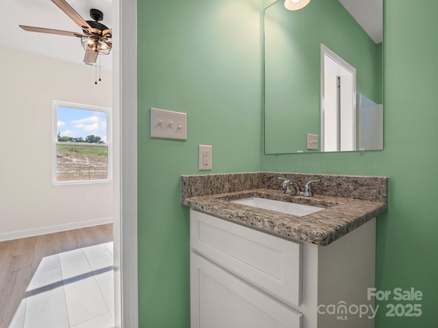 174 Charlie Randall Rd, Lawndale, NC 28090 - bathroom with vanity, a ceiling fan, and wood finished floors