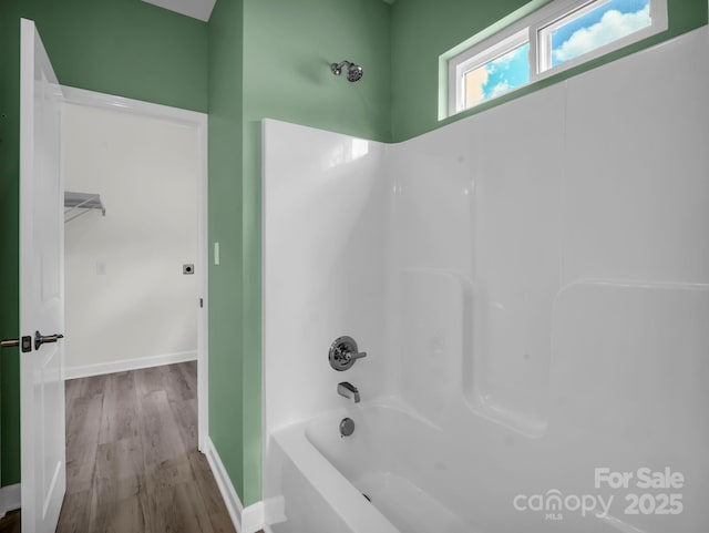 174 Charlie Randall Rd, Lawndale, NC 28090 - bathroom featuring tub / shower combination and wood finished floors