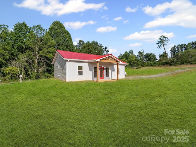 174 Charlie Randall Rd, Lawndale, NC 28090 - view of front of house with a front yard and a metal roof
