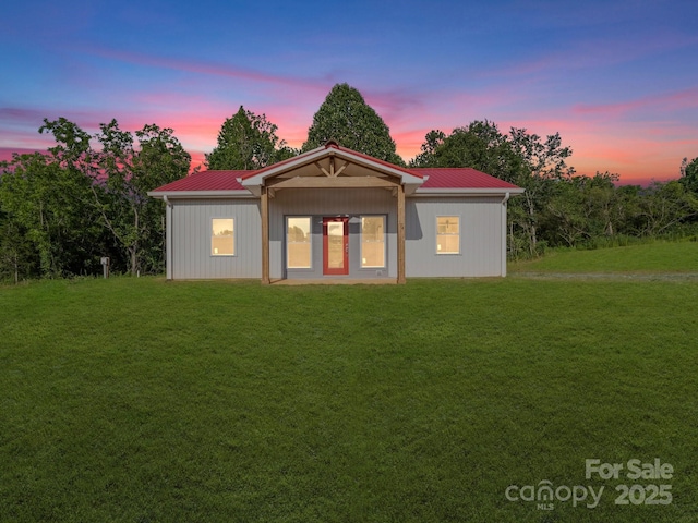174 Charlie Randall Rd, Lawndale, NC 28090 - view of front facade featuring a yard and a metal roof