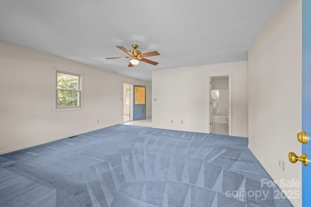 416 Park Ave, Granite Quarry, NC 28072 - unfurnished room featuring a ceiling fan, carpet, and a textured ceiling
