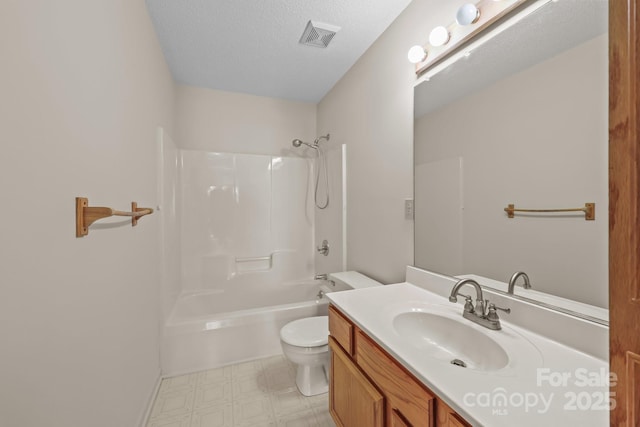 416 Park Ave, Granite Quarry, NC 28072 - full bathroom with tile patterned floors, vanity, bathing tub / shower combination, and a textured ceiling
