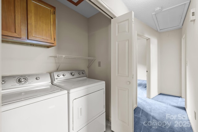 416 Park Ave, Granite Quarry, NC 28072 - washroom with attic access, cabinet space, washing machine and clothes dryer, and light colored carpet