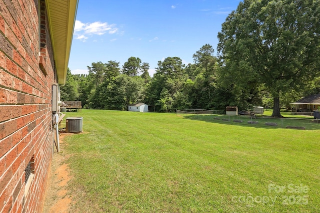 416 Park Ave, Granite Quarry, NC 28072 - view of green lawn featuring a shed