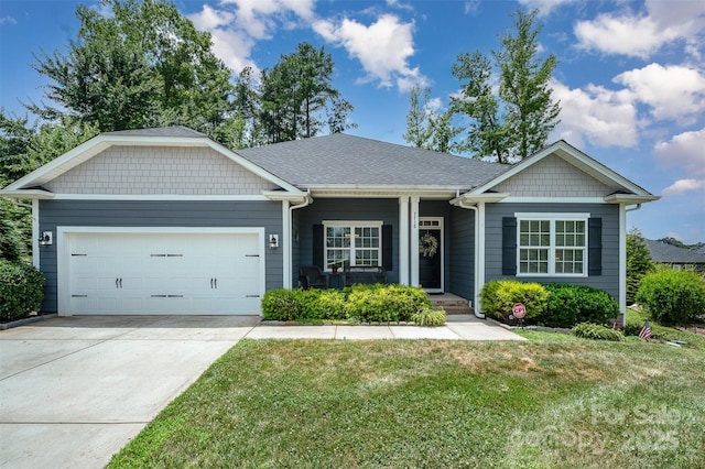 7718 Village Pkwy, Locust, NC 28097 - view of front of house with a garage, a front lawn, and concrete driveway