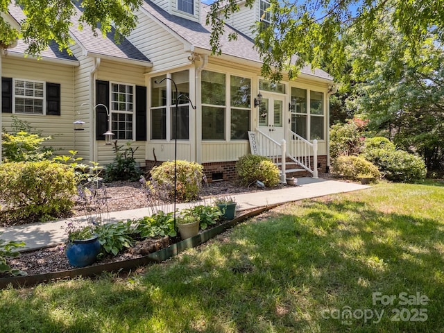 315 Talon Dr, Salisbury, NC 28147 - rear view of property with entry steps, roof with shingles, a yard, and a sunroom