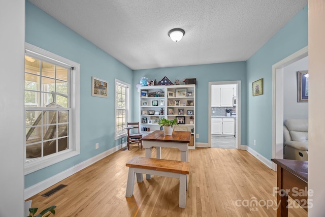 315 Talon Dr, Salisbury, NC 28147 - office featuring light wood-type flooring and a textured ceiling