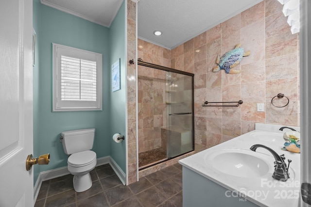 315 Talon Dr, Salisbury, NC 28147 - bathroom featuring a stall shower, double vanity, crown molding, tile patterned flooring, and tile walls