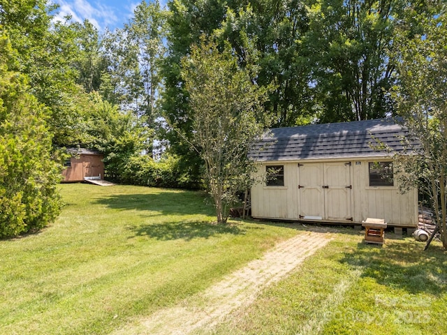 315 Talon Dr, Salisbury, NC 28147 - view of green lawn with a shed
