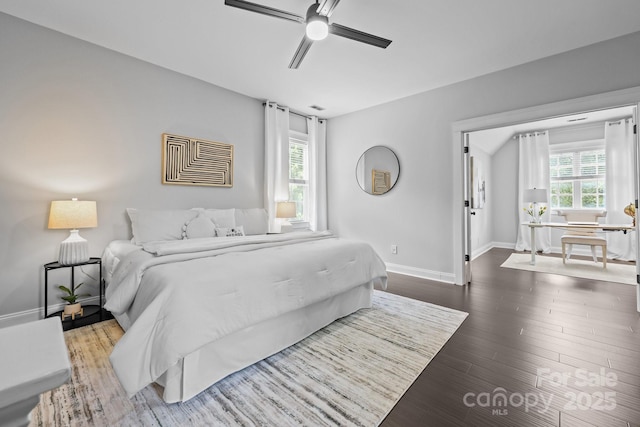 8225 Ballymore Ct, Huntersville, NC 28078 - bedroom featuring multiple windows, wood finished floors, and a ceiling fan
