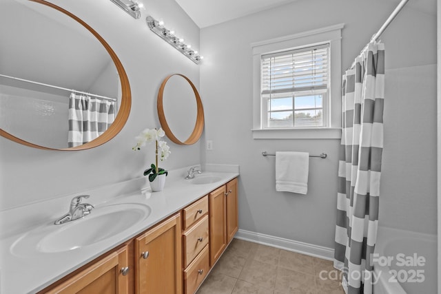 8225 Ballymore Ct, Huntersville, NC 28078 - full bathroom with double vanity, tile patterned floors, and shower / tub combo