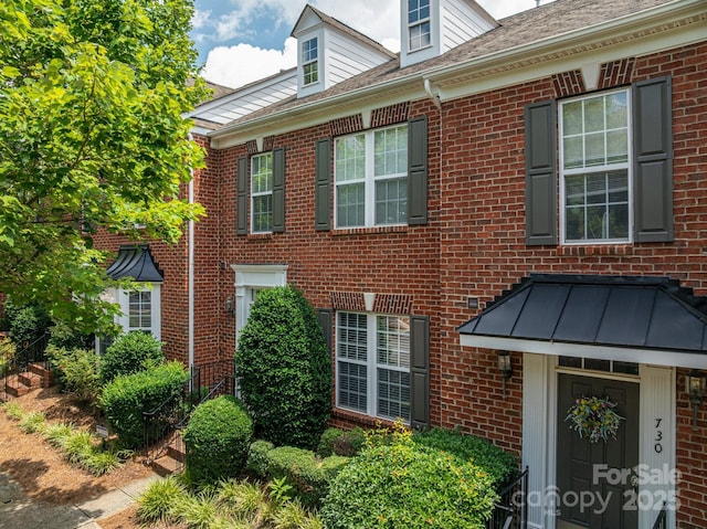 734 Naramore St, Davidson, NC 28036 - view of home's exterior with brick siding