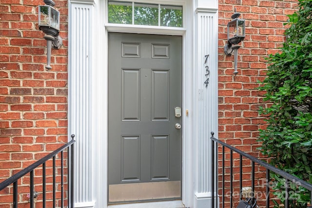 734 Naramore St, Davidson, NC 28036 - entrance to property featuring brick siding
