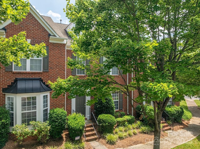734 Naramore St, Davidson, NC 28036 - view of front of home with brick siding