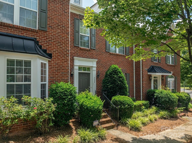 734 Naramore St, Davidson, NC 28036 - view of front of house with brick siding