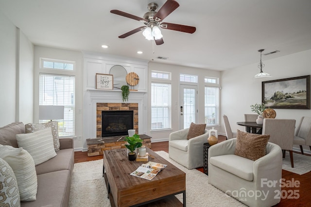 734 Naramore St, Davidson, NC 28036 - living room with ceiling fan, a fireplace, wood finished floors, and recessed lighting