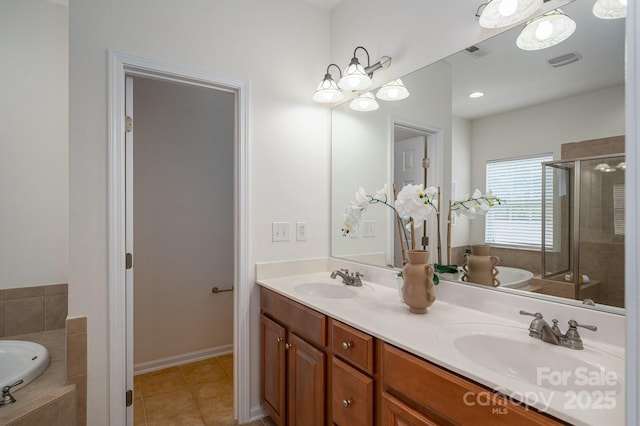 734 Naramore St, Davidson, NC 28036 - full bath with double vanity, a shower stall, a bath, and tile patterned floors
