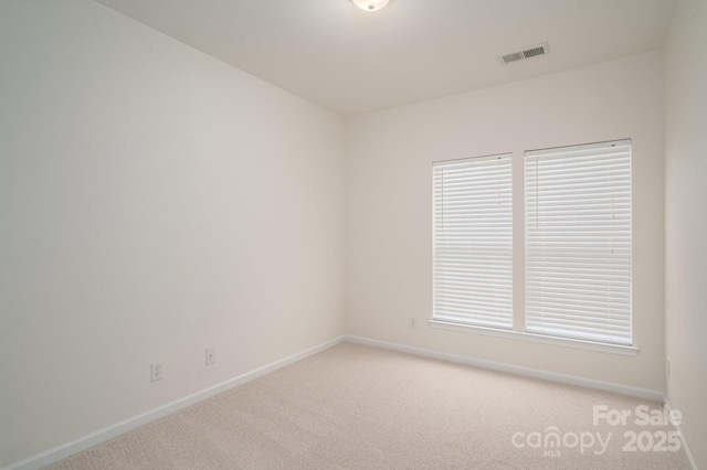 734 Naramore St, Davidson, NC 28036 - empty room with light colored carpet and baseboards