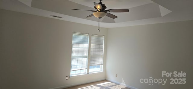 162 Autumn Falls Dr, Lake Wylie, SC 29710 - unfurnished room featuring a ceiling fan, a raised ceiling, and light carpet