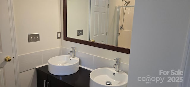 162 Autumn Falls Dr, Lake Wylie, SC 29710 - bathroom featuring tasteful backsplash, tile walls, and a shower