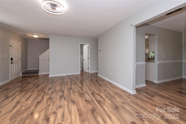 2085 Chapel Creek Rd SW, Concord, NC 28025 - unfurnished room featuring wood finished floors and a textured ceiling