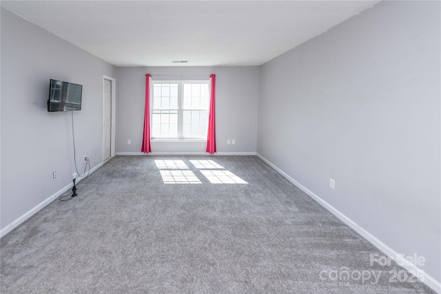 2085 Chapel Creek Rd SW, Concord, NC 28025 - spare room with carpet flooring and baseboards