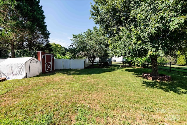 2085 Chapel Creek Rd SW, Concord, NC 28025 - fenced backyard with a storage shed