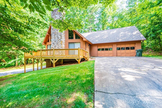 366 Charlois St, Hudson, NC 28638 - view of front of house with a wooden deck, asphalt driveway, a front yard, and roof with shingles