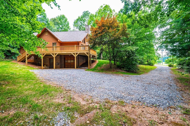 366 Charlois St, Hudson, NC 28638 - view of front of property featuring gravel driveway, a chimney, a deck, stairway, and a front yard
