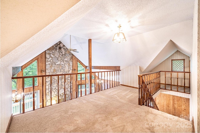 366 Charlois St, Hudson, NC 28638 - additional living space featuring lofted ceiling, carpet flooring, a textured ceiling, and ceiling fan