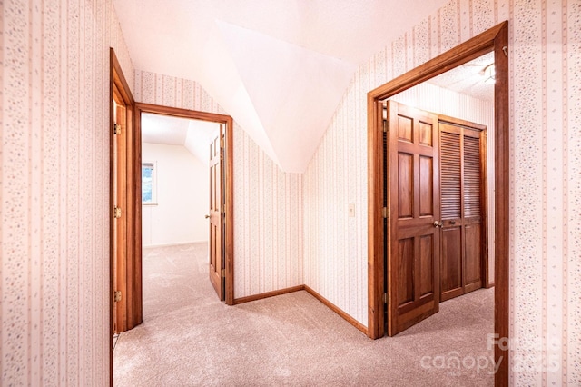 366 Charlois St, Hudson, NC 28638 - hallway with wallpapered walls, carpet, and lofted ceiling