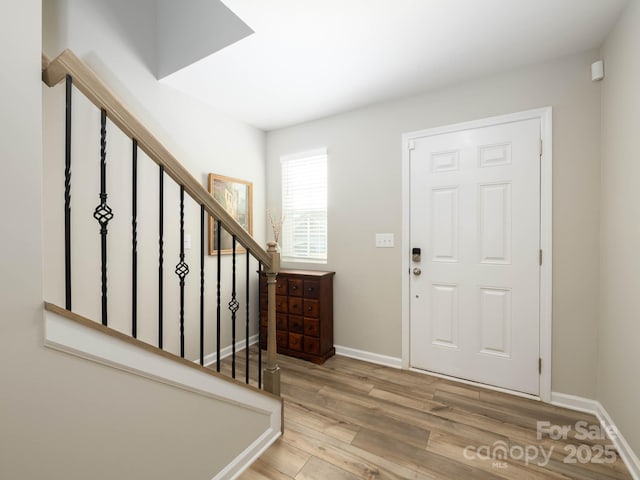 2796 Legacy Ridge Ln, Catawba, NC 28609 - entryway with wood finished floors and stairs