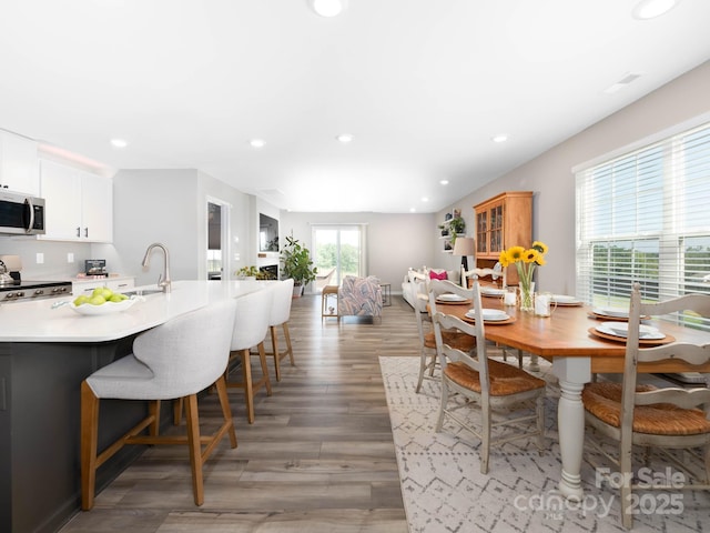 2796 Legacy Ridge Ln, Catawba, NC 28609 - dining space featuring light wood-type flooring and recessed lighting