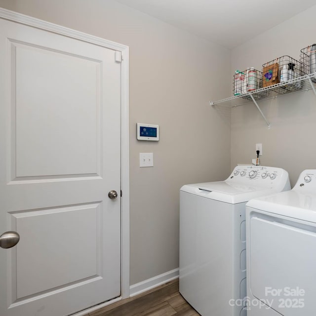 2796 Legacy Ridge Ln, Catawba, NC 28609 - laundry area with washing machine and clothes dryer and wood finished floors