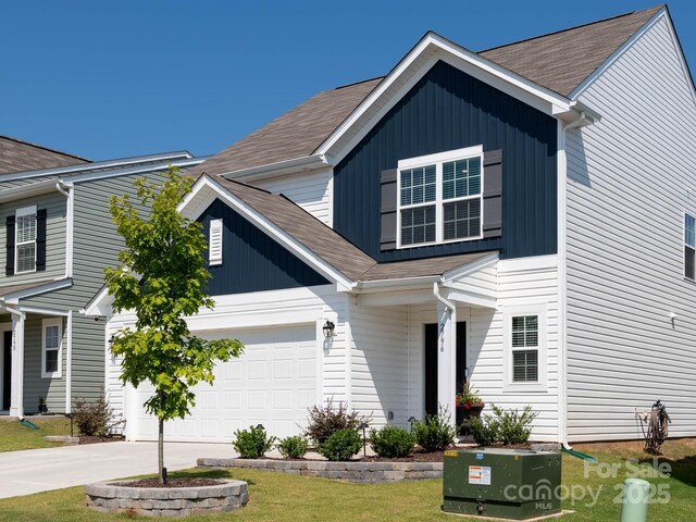2796 Legacy Ridge Ln, Catawba, NC 28609 - traditional home featuring driveway, a shingled roof, and a front yard