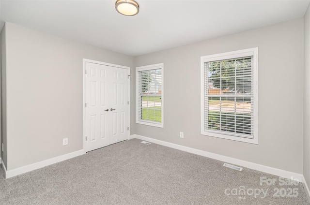 608 Red Hawk Way, Clover, SC 29710 - unfurnished bedroom with carpet and a closet