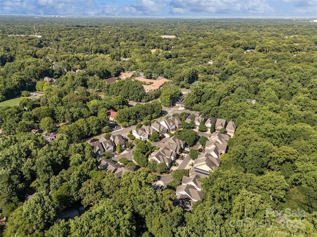 115 Boyce Rd, Charlotte, NC 28211 - aerial view of property and surrounding area featuring a heavily wooded area