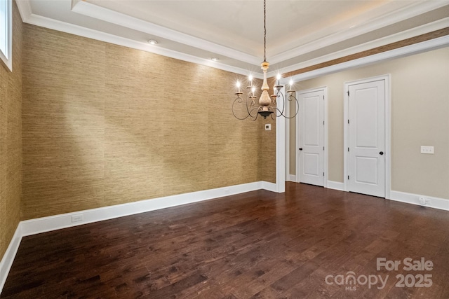 115 Boyce Rd, Charlotte, NC 28211 - unfurnished dining area featuring a tray ceiling, a chandelier, dark wood finished floors, wallpapered walls, and ornamental molding