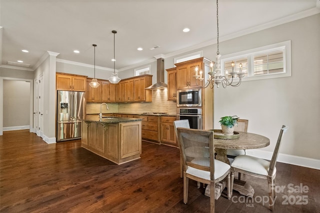 115 Boyce Rd, Charlotte, NC 28211 - kitchen featuring stainless steel appliances, wall chimney range hood, a chandelier, backsplash, and recessed lighting