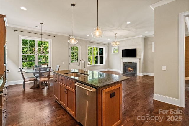 115 Boyce Rd, Charlotte, NC 28211 - kitchen with stainless steel dishwasher, brown cabinetry, recessed lighting, ornamental molding, and dark stone counters