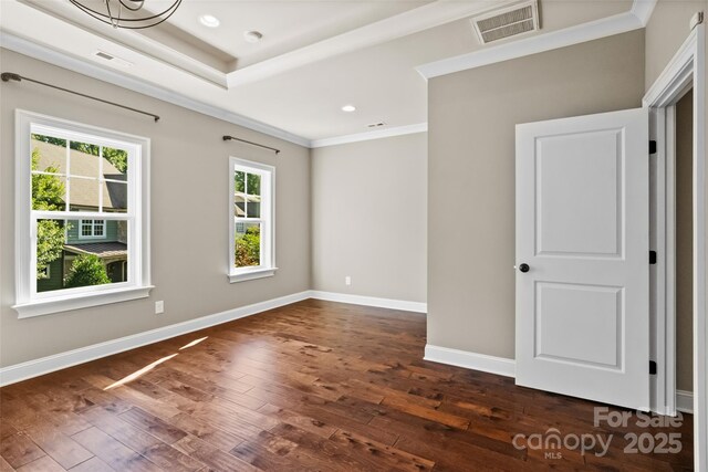 115 Boyce Rd, Charlotte, NC 28211 - empty room with dark wood finished floors, crown molding, and recessed lighting