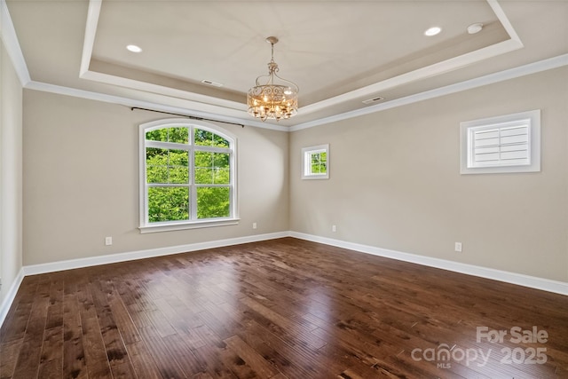115 Boyce Rd, Charlotte, NC 28211 - spare room with a raised ceiling, a chandelier, dark wood-style flooring, ornamental molding, and recessed lighting