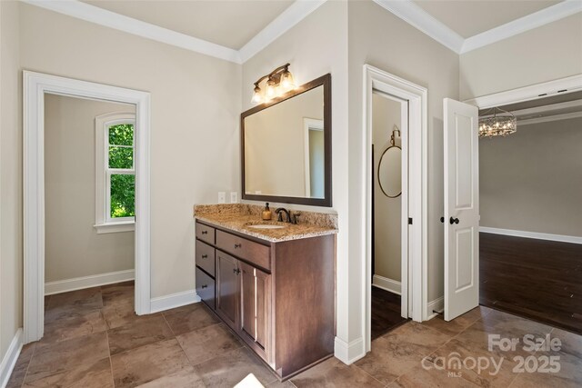 115 Boyce Rd, Charlotte, NC 28211 - bathroom featuring vanity, ornamental molding, and a chandelier