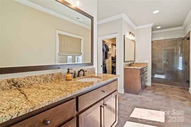 115 Boyce Rd, Charlotte, NC 28211 - full bathroom with crown molding, vanity, a stall shower, a walk in closet, and recessed lighting