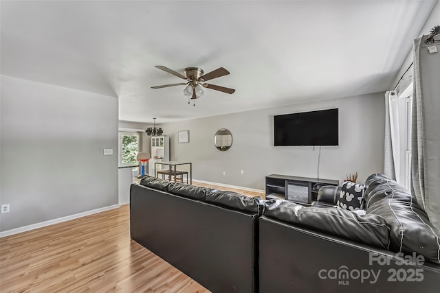 1631 Berkley St SW, Lenoir, NC 28645 - living room with ceiling fan and light wood-style floors