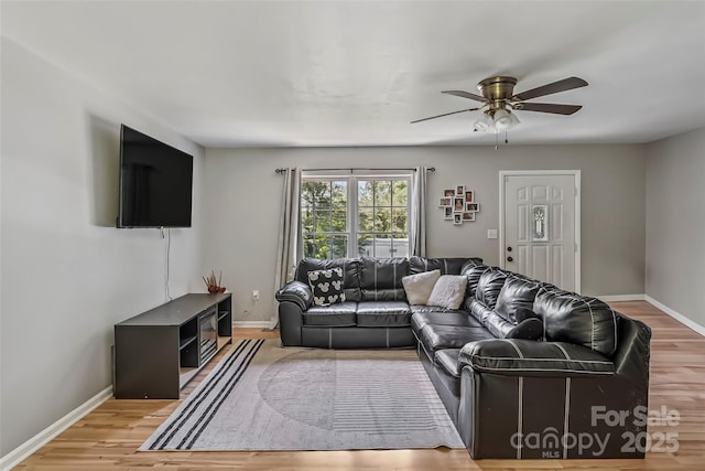 1631 Berkley St SW, Lenoir, NC 28645 - living area featuring ceiling fan and light wood-style floors