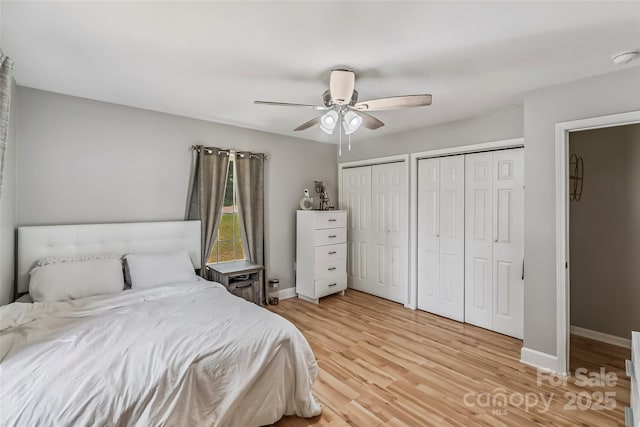 1631 Berkley St SW, Lenoir, NC 28645 - bedroom with multiple closets, light wood-style floors, and ceiling fan