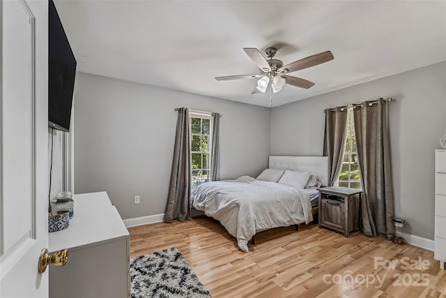 1631 Berkley St SW, Lenoir, NC 28645 - bedroom featuring light wood finished floors and ceiling fan